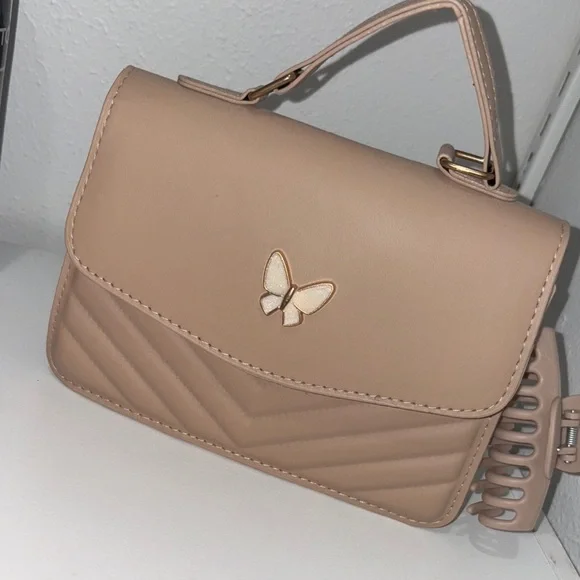 Elegant Tan Handbag with Butterfly Accent - Picture 1 of 1